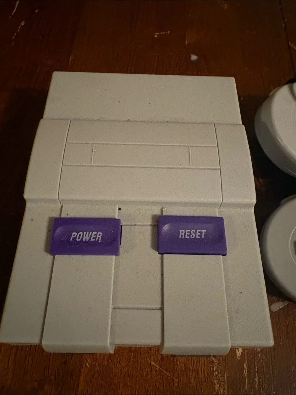 Nintendo Mini Gaming Console in Gray with Purple Buttons and Gray Controllers